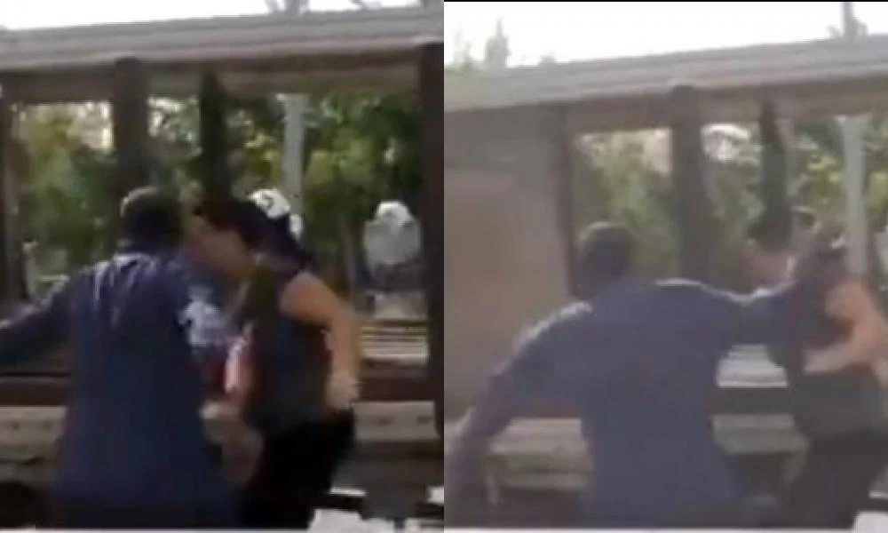Ρομά μαλώνει με τα ΜΑΤ και πλακώνει στο ξύλο την γυναίκα του!